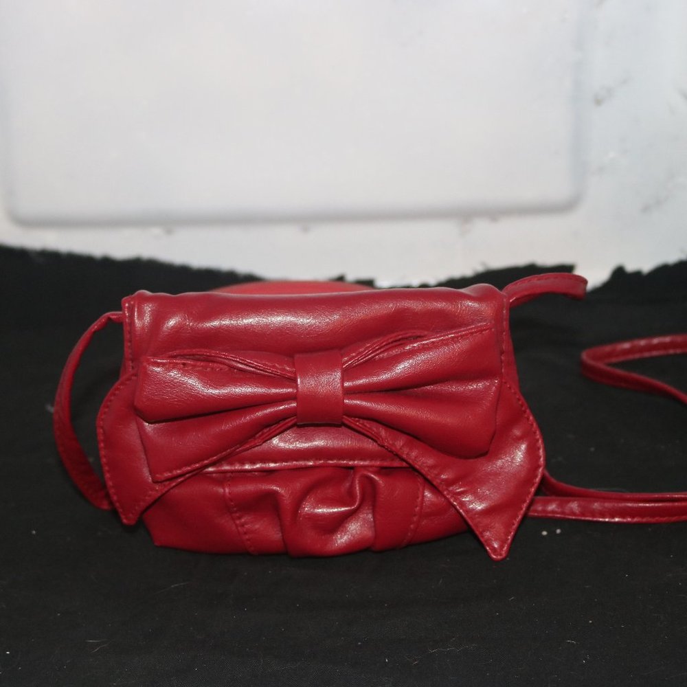 Small Red Bow on flap purse with crossover body strap great for nights out